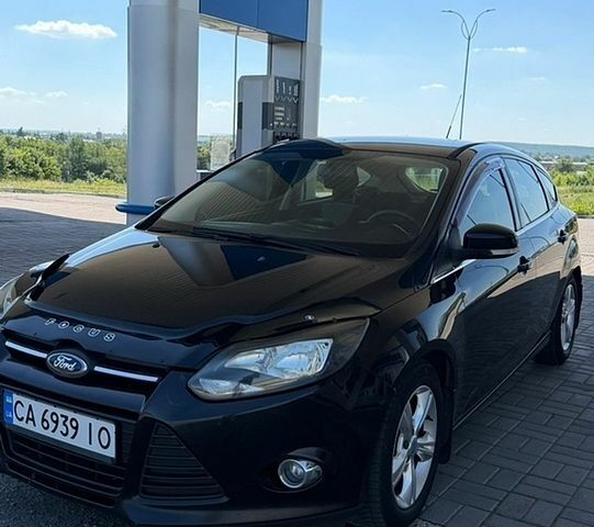 Черный Форд Фокус, объемом двигателя 1.6 л и пробегом 277 тыс. км за 6500 $, фото 1 на Automoto.ua