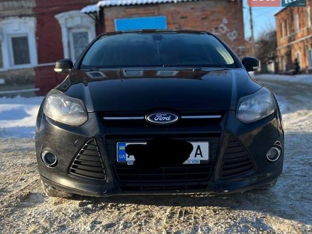 Черный Форд Фокус, объемом двигателя 1.6 л и пробегом 250 тыс. км за 7100 $, фото 1 на Automoto.ua