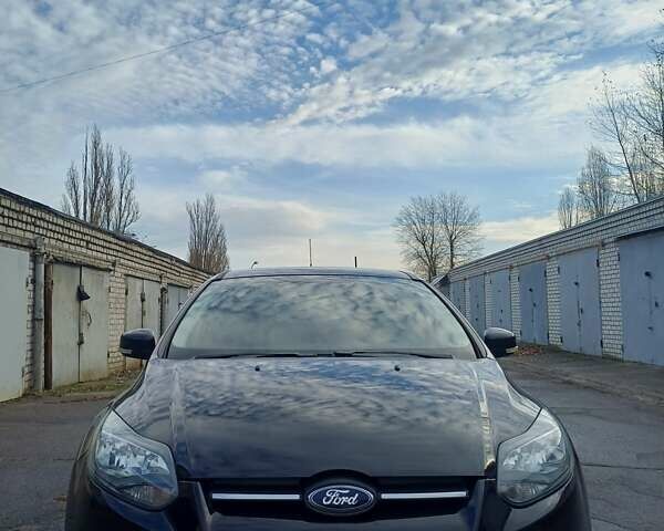 Черный Форд Фокус, объемом двигателя 1.6 л и пробегом 156 тыс. км за 7700 $, фото 1 на Automoto.ua