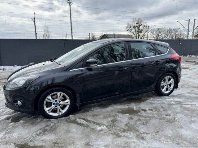 Черный Форд Фокус, объемом двигателя 1.6 л и пробегом 169 тыс. км за 7900 $, фото 1 на Automoto.ua