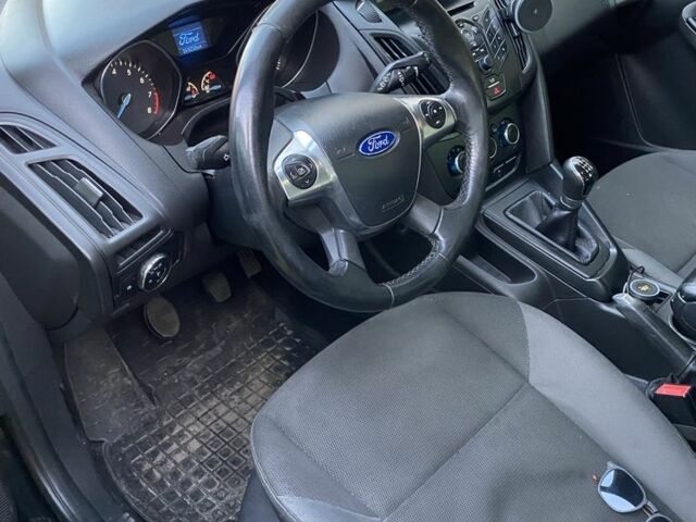 Черный Форд Фокус, объемом двигателя 1 л и пробегом 168 тыс. км за 4700 $, фото 1 на Automoto.ua