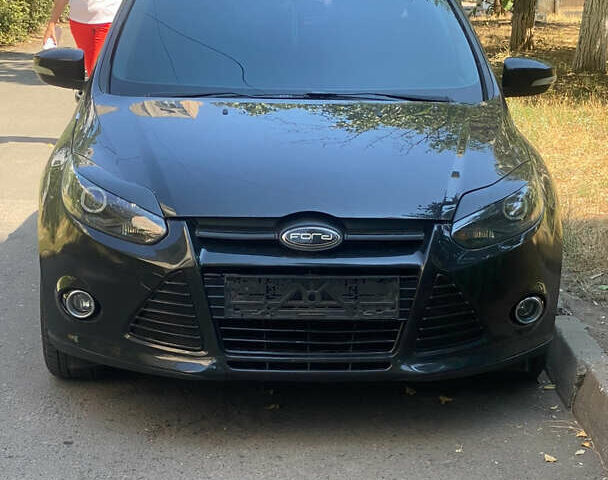 Черный Форд Фокус, объемом двигателя 2 л и пробегом 178 тыс. км за 7500 $, фото 1 на Automoto.ua