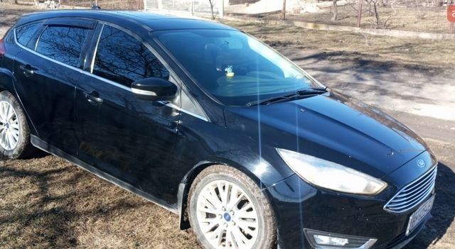 Черный Форд Фокус, объемом двигателя 1.9 л и пробегом 165 тыс. км за 9200 $, фото 1 на Automoto.ua
