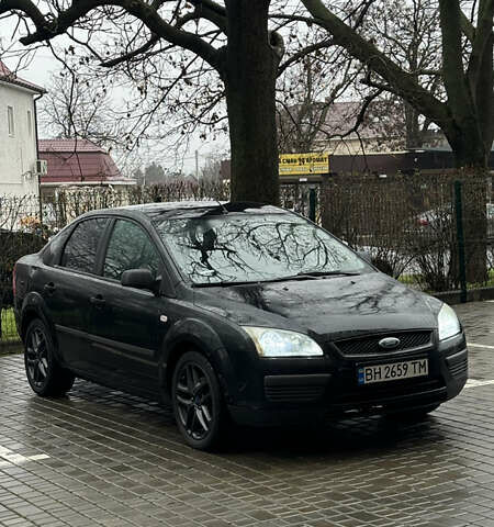 Черный Форд Фокус, объемом двигателя 1.39 л и пробегом 201 тыс. км за 4899 $, фото 1 на Automoto.ua