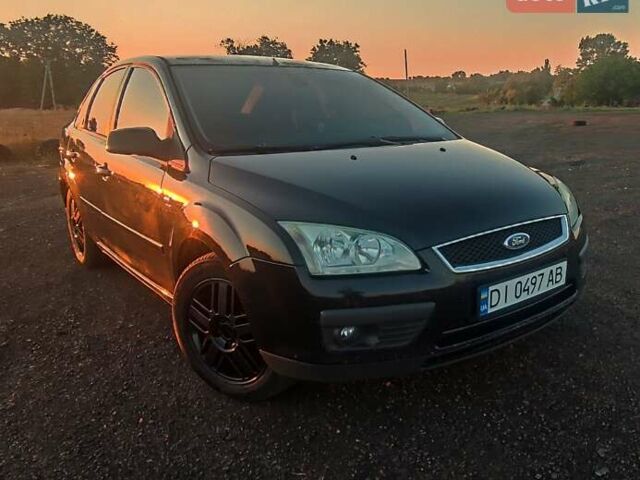 Черный Форд Фокус, объемом двигателя 1.6 л и пробегом 150 тыс. км за 5300 $, фото 1 на Automoto.ua