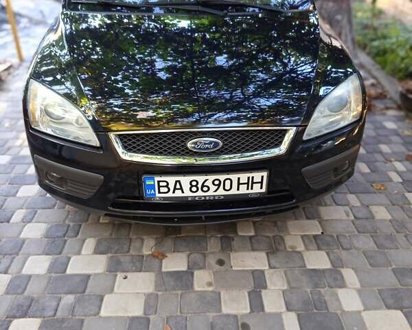 Черный Форд Фокус, объемом двигателя 1.6 л и пробегом 235 тыс. км за 5400 $, фото 1 на Automoto.ua