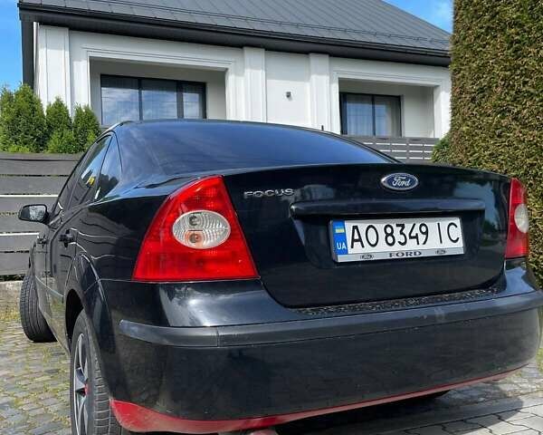 Черный Форд Фокус, объемом двигателя 1.6 л и пробегом 85 тыс. км за 3800 $, фото 1 на Automoto.ua