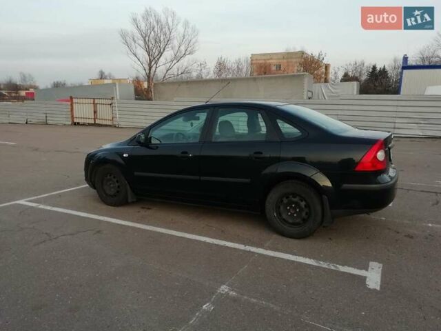 Черный Форд Фокус, объемом двигателя 1.4 л и пробегом 31 тыс. км за 6000 $, фото 1 на Automoto.ua