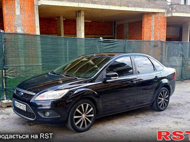 Черный Форд Фокус, объемом двигателя 1.6 л и пробегом 248 тыс. км за 5300 $, фото 1 на Automoto.ua