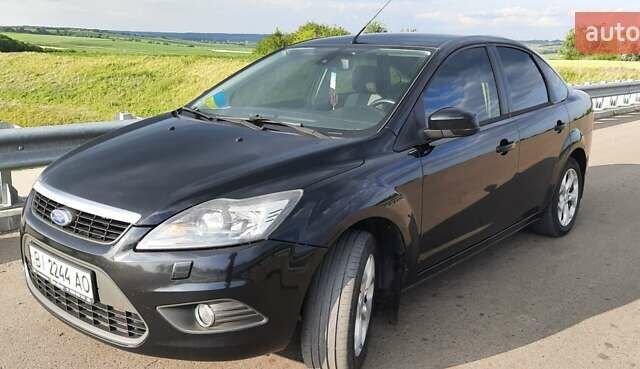 Черный Форд Фокус, объемом двигателя 1.6 л и пробегом 211 тыс. км за 6800 $, фото 1 на Automoto.ua