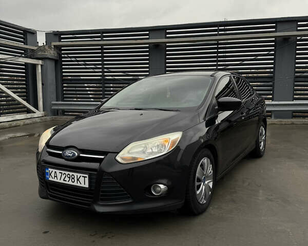 Чорний Форд Фокус, об'ємом двигуна 2 л та пробігом 347 тис. км за 5799 $, фото 1 на Automoto.ua