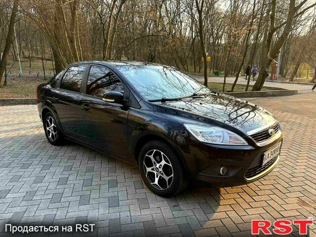 Черный Форд Фокус, объемом двигателя 1.6 л и пробегом 180 тыс. км за 5700 $, фото 1 на Automoto.ua