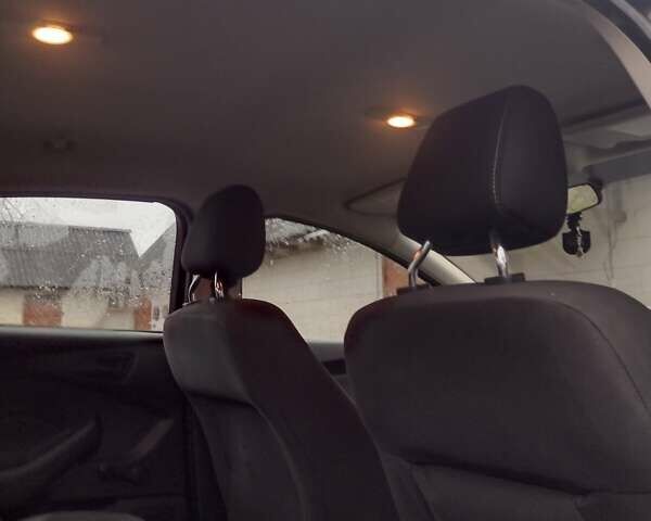 Чорний Форд Фокус, об'ємом двигуна 2 л та пробігом 253 тис. км за 6500 $, фото 1 на Automoto.ua