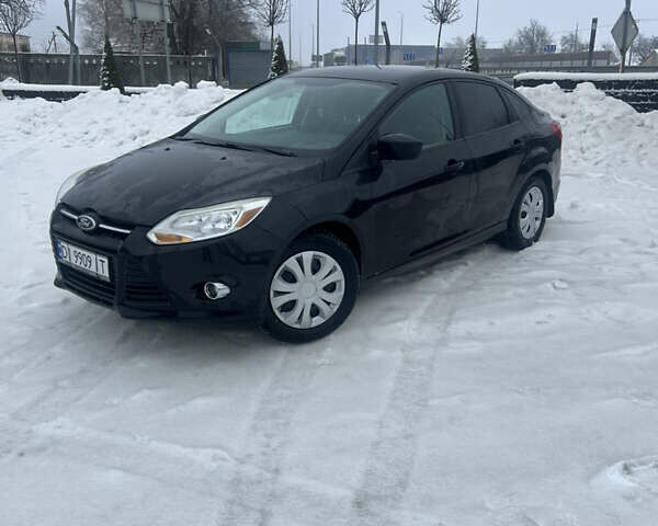 Чорний Форд Фокус, об'ємом двигуна 2 л та пробігом 232 тис. км за 6500 $, фото 1 на Automoto.ua