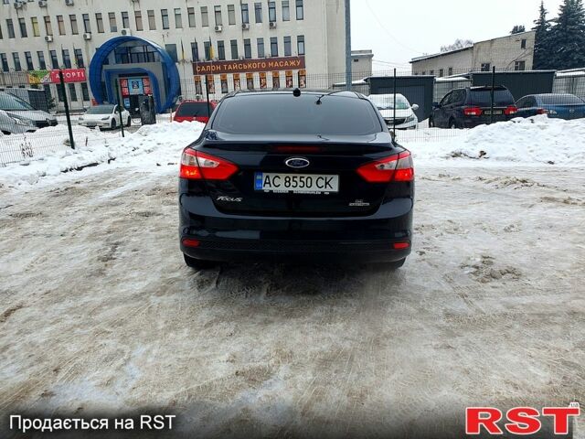 Черный Форд Фокус, объемом двигателя 2 л и пробегом 22800 тыс. км за 7100 $, фото 1 на Automoto.ua