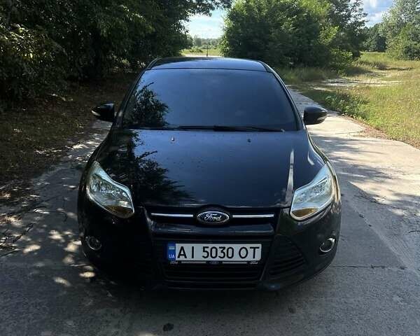 Черный Форд Фокус, объемом двигателя 2 л и пробегом 204 тыс. км за 7300 $, фото 1 на Automoto.ua