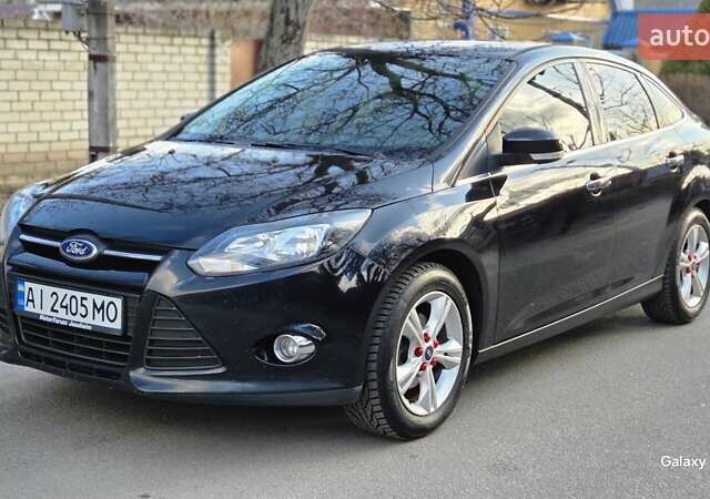 Черный Форд Фокус, объемом двигателя 1 л и пробегом 191 тыс. км за 5600 $, фото 1 на Automoto.ua
