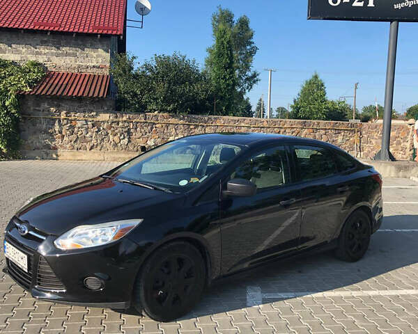 Черный Форд Фокус, объемом двигателя 2.01 л и пробегом 180 тыс. км за 7200 $, фото 1 на Automoto.ua
