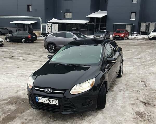 Чорний Форд Фокус, об'ємом двигуна 2 л та пробігом 228 тис. км за 7100 $, фото 1 на Automoto.ua
