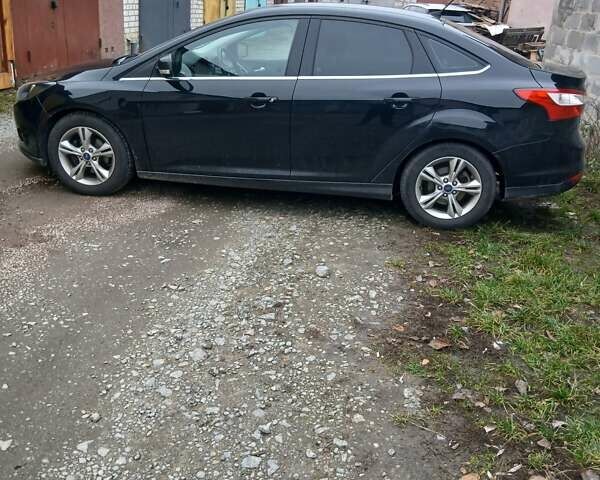 Черный Форд Фокус, объемом двигателя 1 л и пробегом 60 тыс. км за 8000 $, фото 1 на Automoto.ua