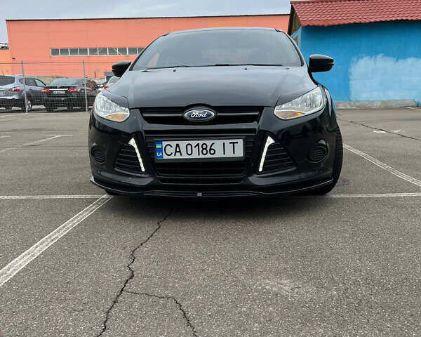 Черный Форд Фокус, объемом двигателя 2 л и пробегом 300 тыс. км за 7500 $, фото 1 на Automoto.ua