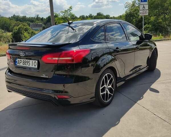 Черный Форд Фокус, объемом двигателя 2 л и пробегом 156 тыс. км за 7600 $, фото 1 на Automoto.ua