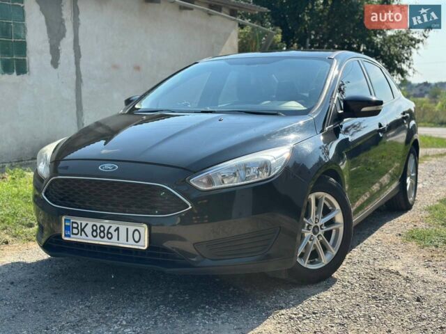 Чорний Форд Фокус, об'ємом двигуна 2 л та пробігом 124 тис. км за 9100 $, фото 1 на Automoto.ua
