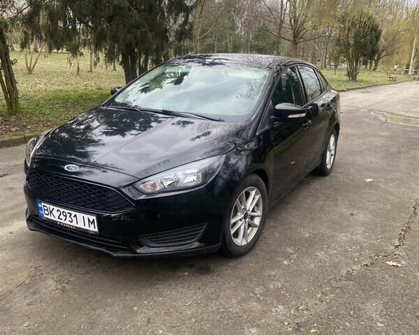 Черный Форд Фокус, объемом двигателя 2 л и пробегом 74 тыс. км за 7999 $, фото 1 на Automoto.ua