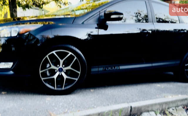 Черный Форд Фокус, объемом двигателя 2 л и пробегом 97 тыс. км за 8300 $, фото 1 на Automoto.ua