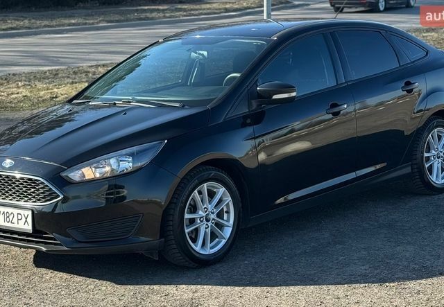 Черный Форд Фокус, объемом двигателя 2 л и пробегом 104 тыс. км за 9800 $, фото 1 на Automoto.ua