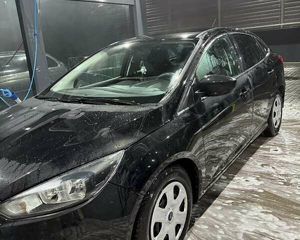 Чорний Форд Фокус, об'ємом двигуна 2 л та пробігом 60 тис. км за 10750 $, фото 1 на Automoto.ua