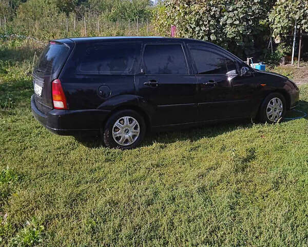 Черный Форд Фокус, объемом двигателя 1.8 л и пробегом 420 тыс. км за 3100 $, фото 1 на Automoto.ua