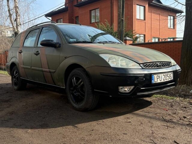 Черный Форд Фокус, объемом двигателя 1.8 л и пробегом 200 тыс. км за 1350 $, фото 1 на Automoto.ua