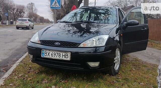Черный Форд Фокус, объемом двигателя 1.6 л и пробегом 155 тыс. км за 4750 $, фото 1 на Automoto.ua