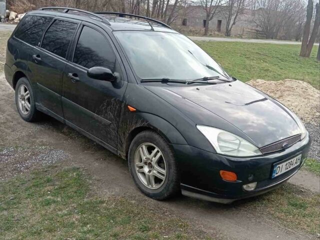 Черный Форд Фокус, объемом двигателя 1.8 л и пробегом 334 тыс. км за 2300 $, фото 1 на Automoto.ua