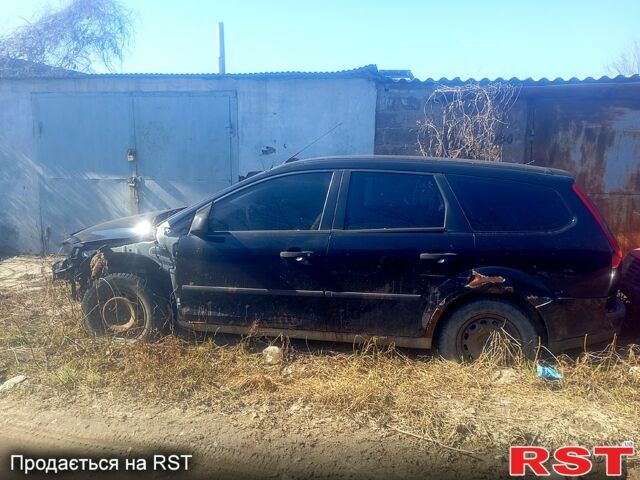 Черный Форд Фокус, объемом двигателя 1.6 л и пробегом 300 тыс. км за 3200 $, фото 1 на Automoto.ua