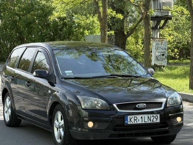 Черный Форд Фокус, объемом двигателя 2 л и пробегом 330 тыс. км за 2300 $, фото 1 на Automoto.ua