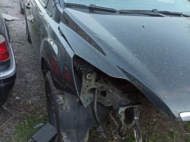 Черный Форд Фокус, объемом двигателя 1.6 л и пробегом 210 тыс. км за 1000 $, фото 1 на Automoto.ua