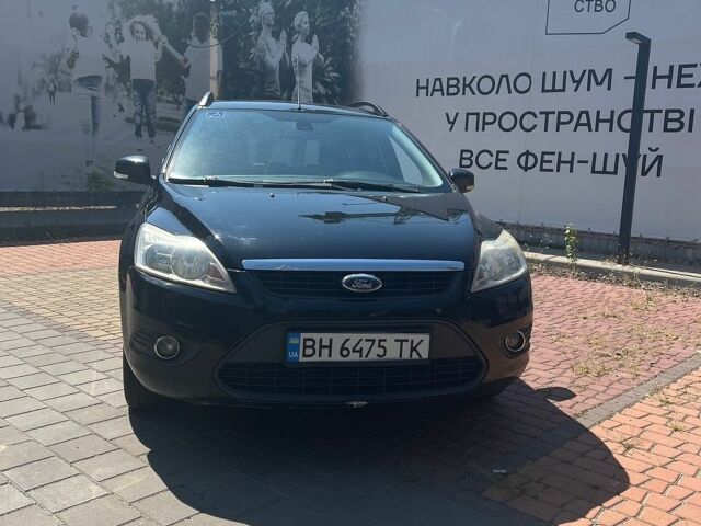 Черный Форд Фокус, объемом двигателя 1.6 л и пробегом 207 тыс. км за 5700 $, фото 1 на Automoto.ua