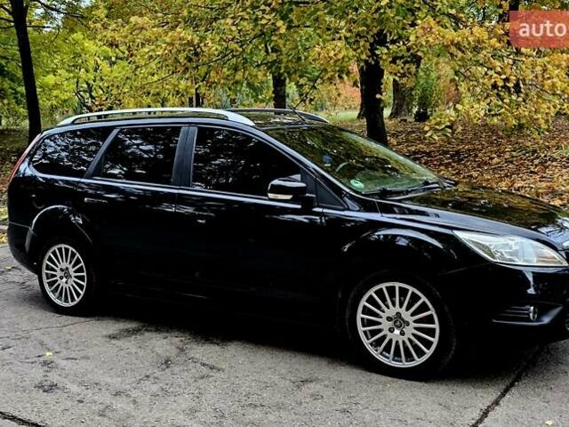 Черный Форд Фокус, объемом двигателя 1.8 л и пробегом 170 тыс. км за 6300 $, фото 1 на Automoto.ua