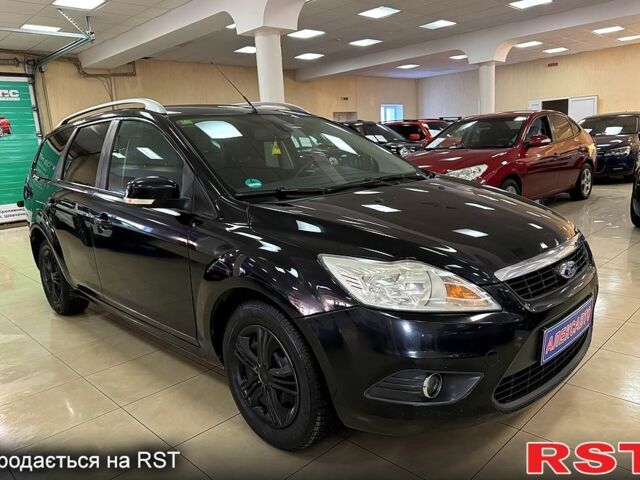 Черный Форд Фокус, объемом двигателя 1.8 л и пробегом 19300 тыс. км за 5400 $, фото 1 на Automoto.ua