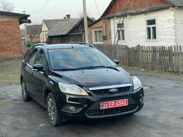 Черный Форд Фокус, объемом двигателя 1.8 л и пробегом 152 тыс. км за 6502 $, фото 1 на Automoto.ua