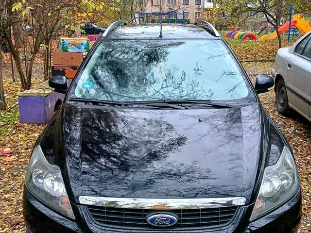 Черный Форд Фокус, объемом двигателя 1.6 л и пробегом 194 тыс. км за 5999 $, фото 1 на Automoto.ua