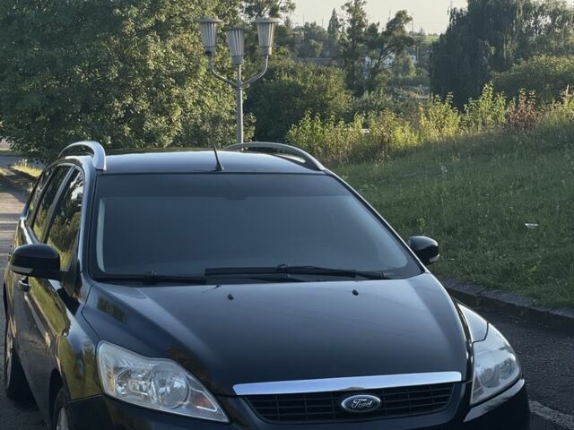 Чорний Форд Фокус, об'ємом двигуна 2 л та пробігом 365 тис. км за 6599 $, фото 1 на Automoto.ua