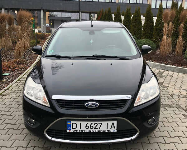Черный Форд Фокус, объемом двигателя 2 л и пробегом 235 тыс. км за 5300 $, фото 1 на Automoto.ua