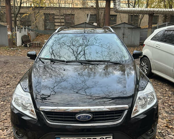 Черный Форд Фокус, объемом двигателя 1.6 л и пробегом 256 тыс. км за 5700 $, фото 1 на Automoto.ua