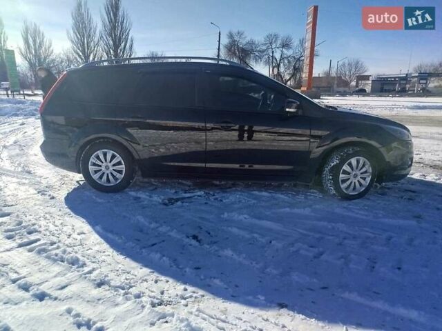 Черный Форд Фокус, объемом двигателя 1.8 л и пробегом 220 тыс. км за 5800 $, фото 1 на Automoto.ua