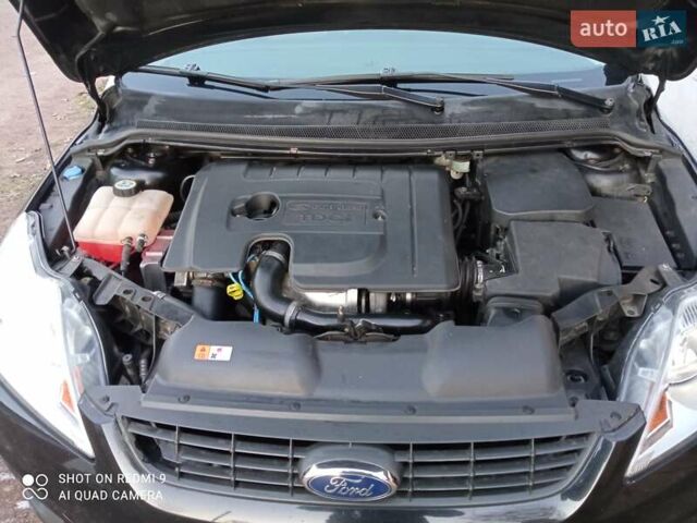 Черный Форд Фокус, объемом двигателя 1.6 л и пробегом 242 тыс. км за 5800 $, фото 1 на Automoto.ua