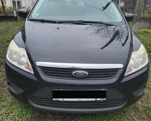 Черный Форд Фокус, объемом двигателя 1.56 л и пробегом 245 тыс. км за 5400 $, фото 1 на Automoto.ua