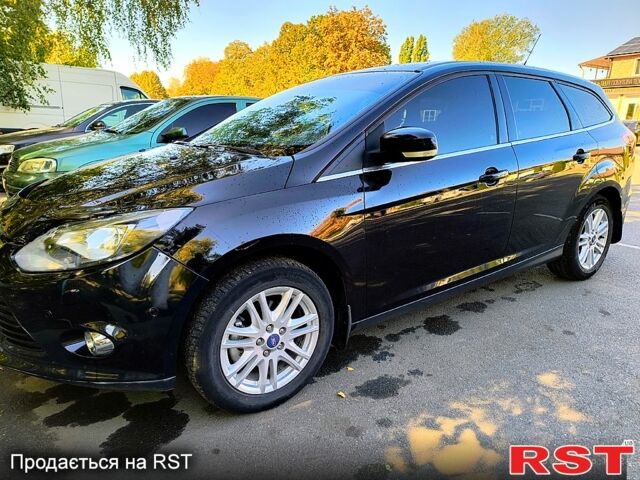 Черный Форд Фокус, объемом двигателя 1.6 л и пробегом 220 тыс. км за 8100 $, фото 1 на Automoto.ua